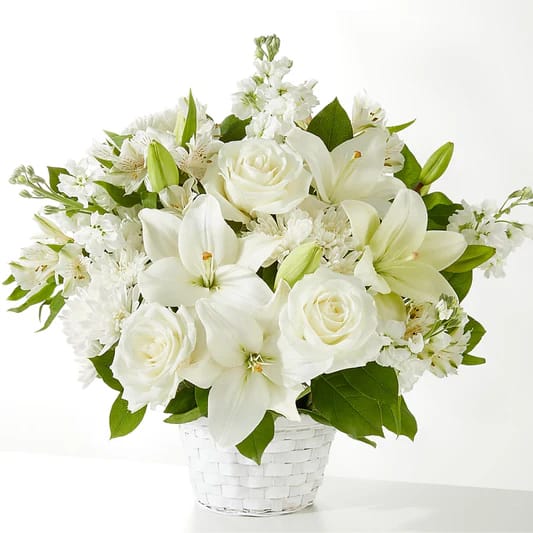Arrangement floral funéraire blanc en vase