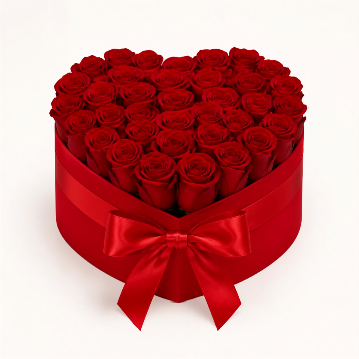 Boîte florale cœur rouge avec roses rouges